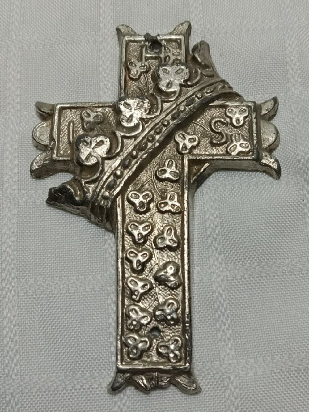Vintage Cross with a crown, a traditional Christian symbol, marqued